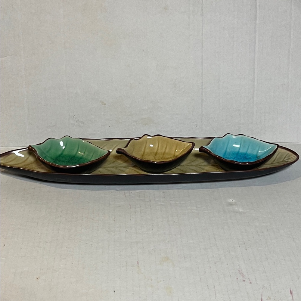 Pier 1 Imports stoneware leaf-shaped dipping bowls on a matching serving tray